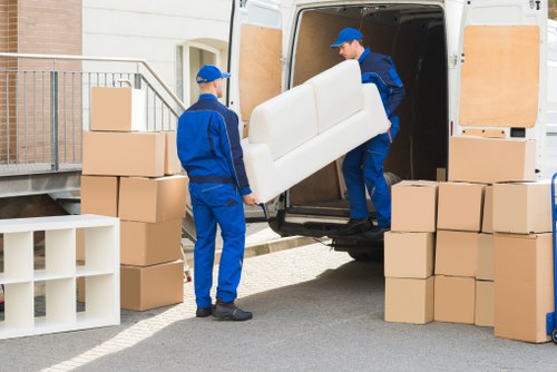 Packed office boxes and equipment ready for transport