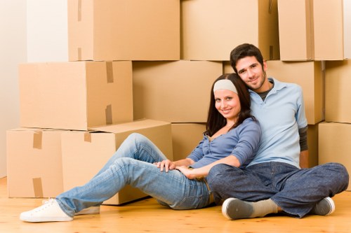 Loading furniture into a removals van for a local move