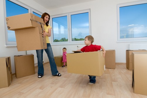 Furniture being carried from a traditional Scottish flat