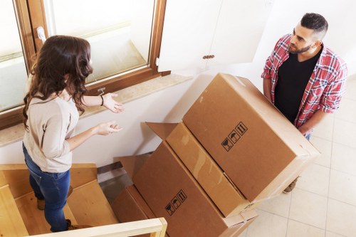 Office relocation setup with labeled boxes and furniture