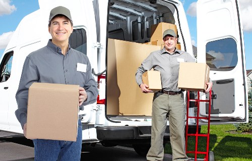 Commercial office furniture and equipment being prepared for relocation