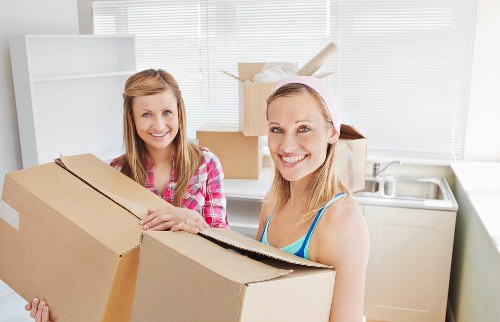 Loading household items into a van for a local move in Scotland