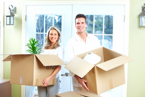 Preparing items for a house move with packed boxes