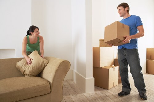 Packed boxes and furniture ready for home removals